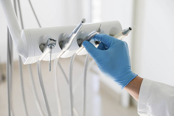 Professional Tooth Extraction technician working in Old Stine, CA